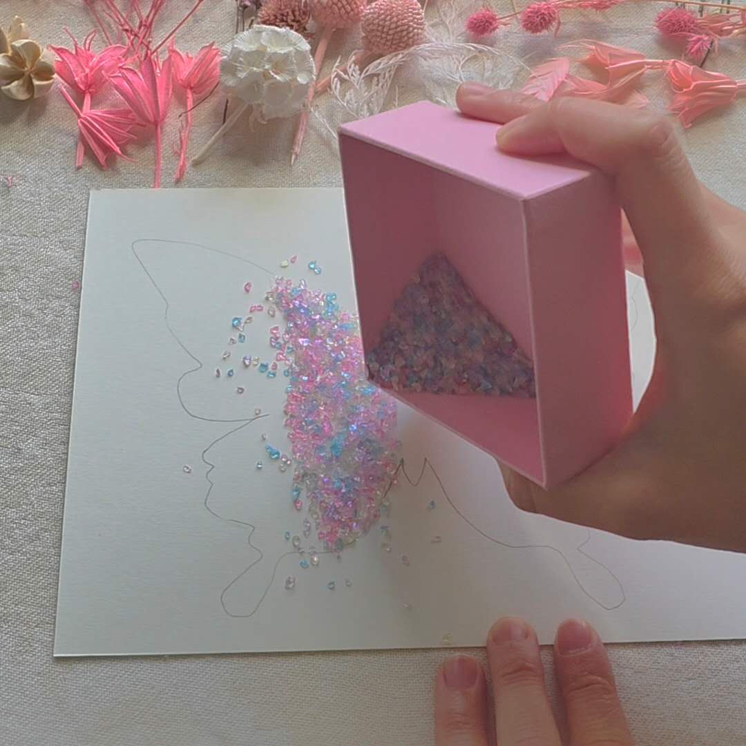 Glue & sprinkle the crystals